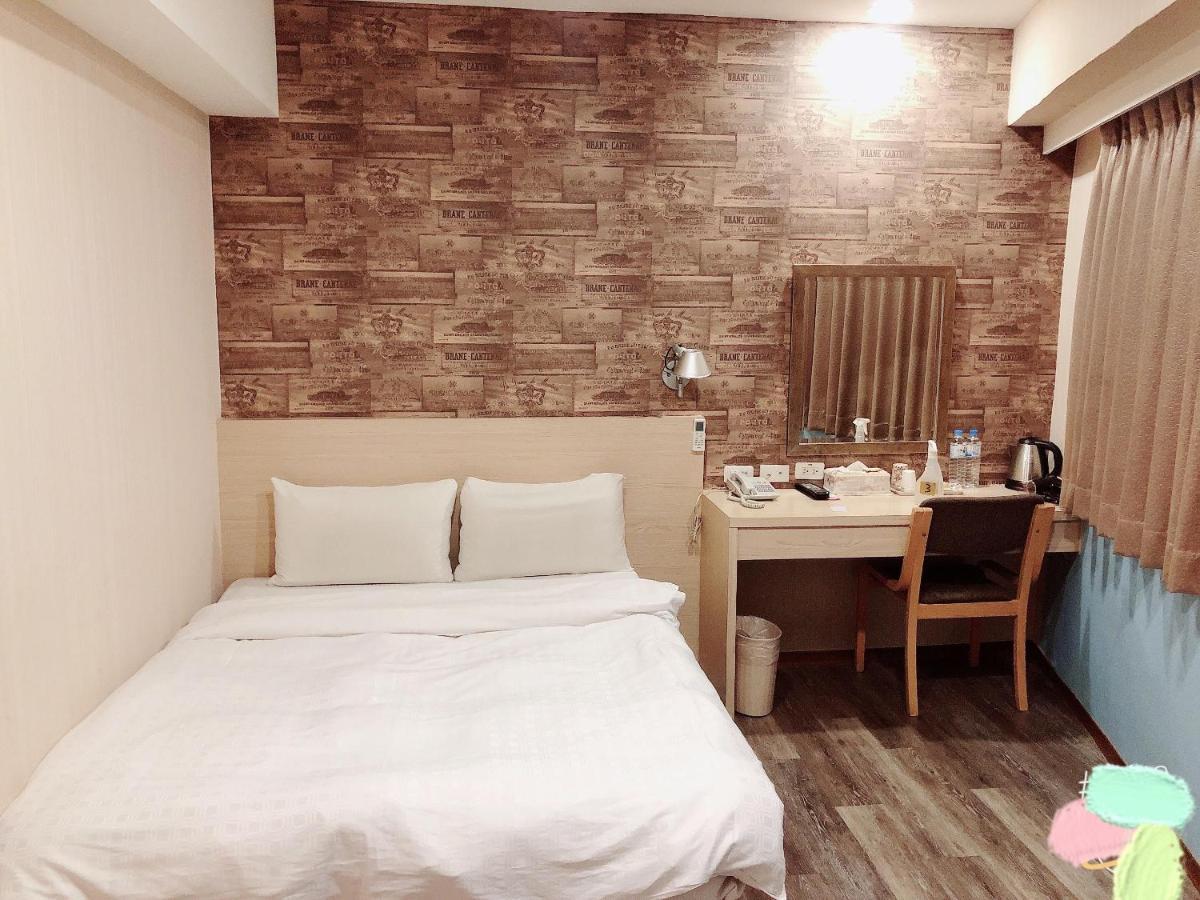 Sanduo Hotel Kaohsiung Bagian luar foto