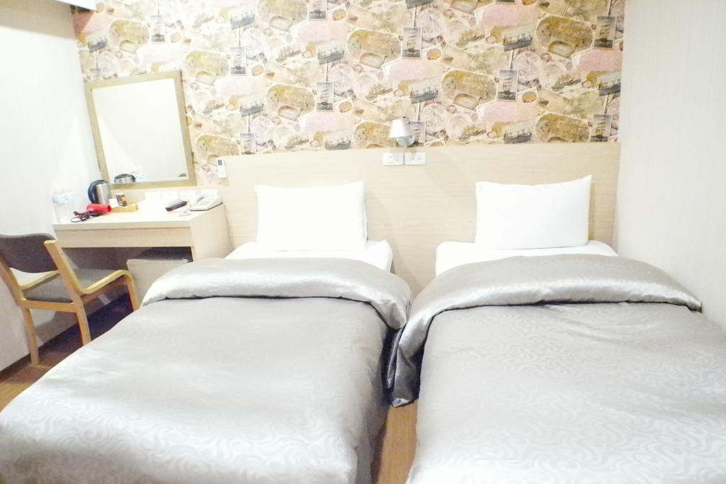 Sanduo Hotel Kaohsiung Bagian luar foto