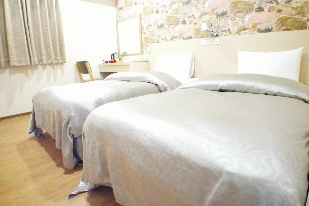 Sanduo Hotel Kaohsiung Bagian luar foto